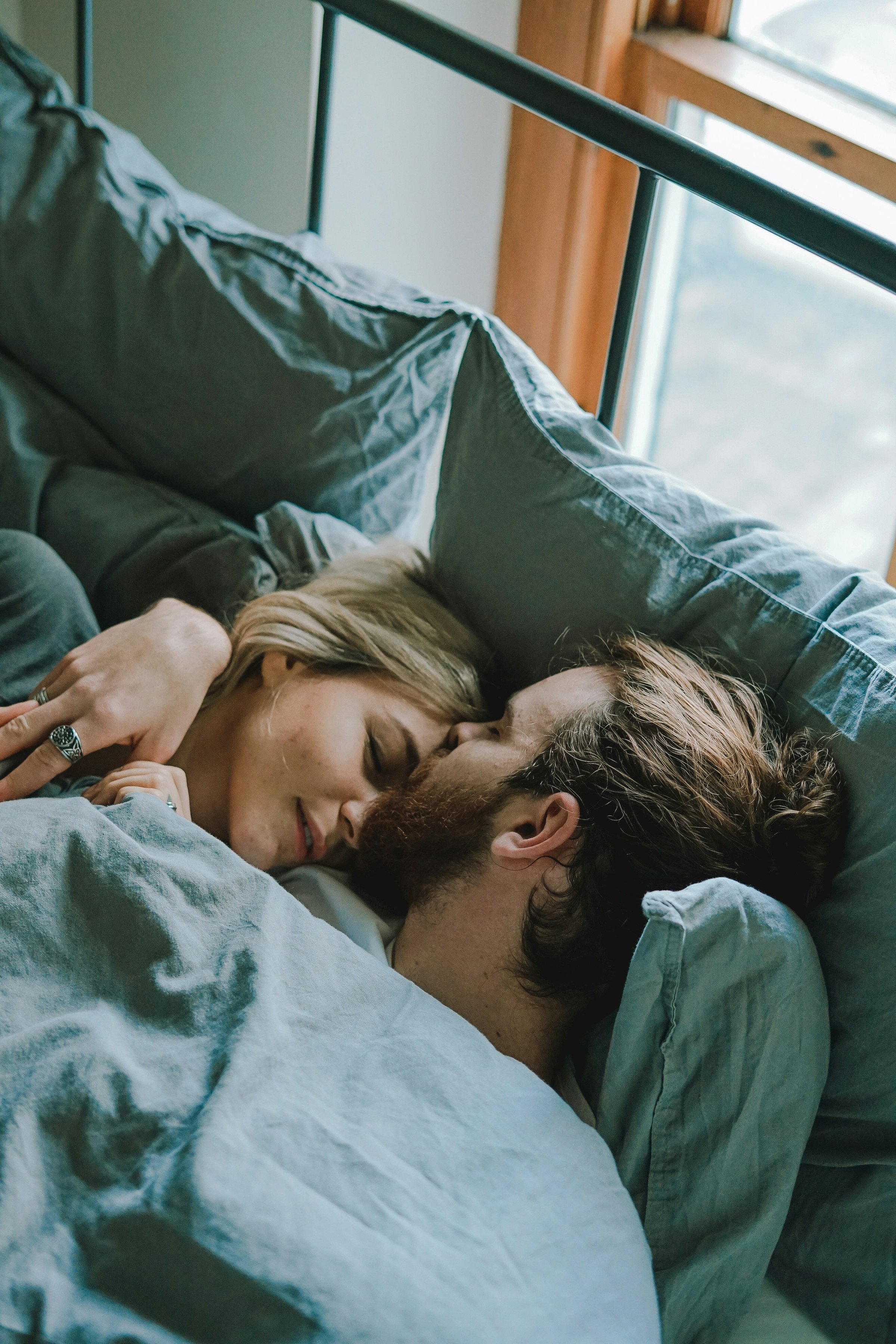 Couple lying together, intimate moment
